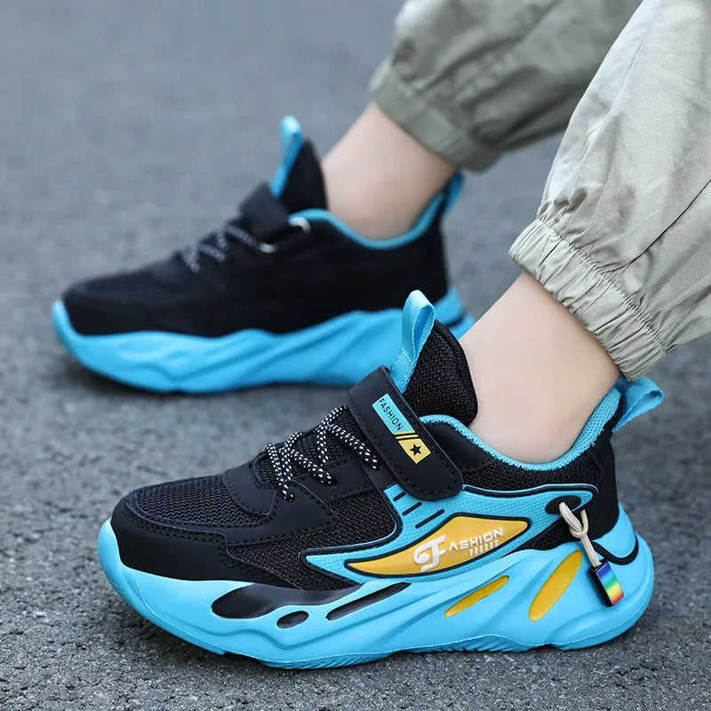 Boy's dark blue and black Velcro-fastened platform sports running shoes with breathable mesh upper.