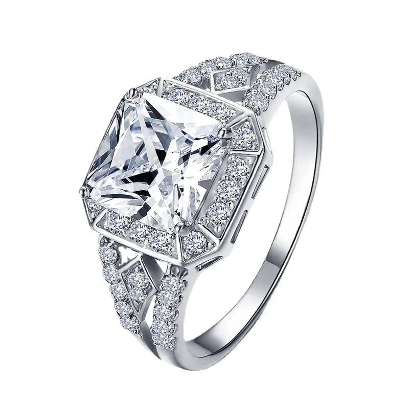 Geometric hollowed zircon ring in platinum colour on copper with quadrilateral design