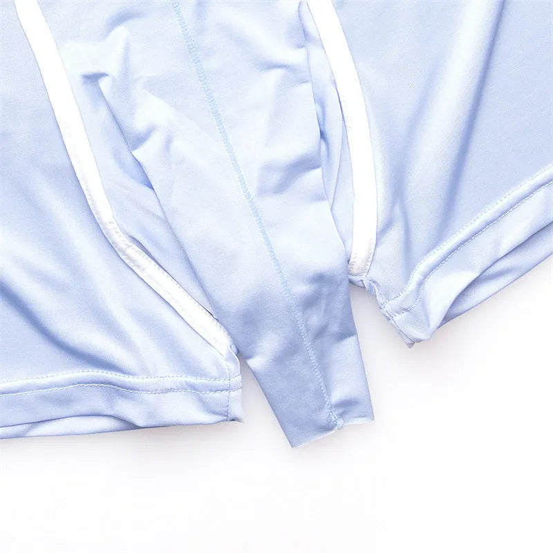 Men's solid colour ice silk boxer shorts in blue, shown on a mannequin, demonstrating the mid waist fit.