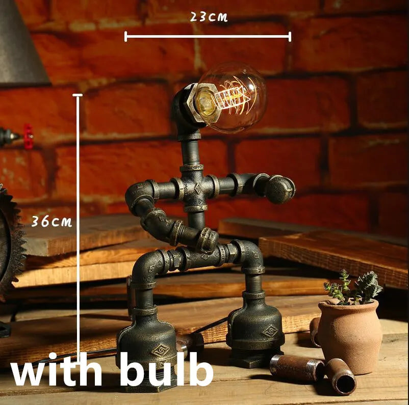Robot vintage industrial table lamp with iron pipe construction in green bronze finish