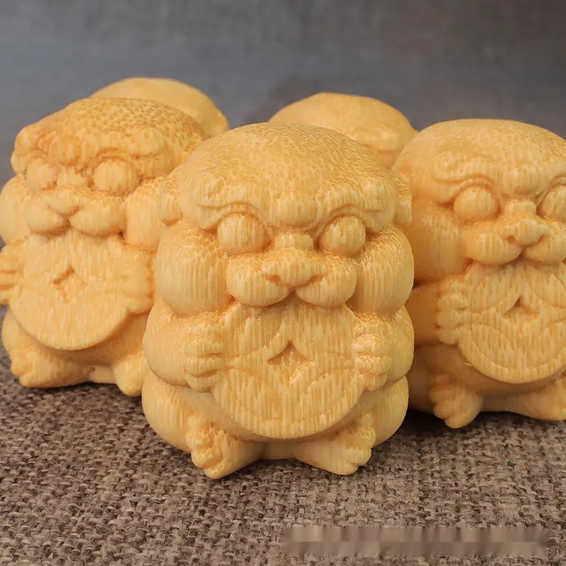 Solid bamboo money cat carving ornament measuring 4.5cm by 3.5cm