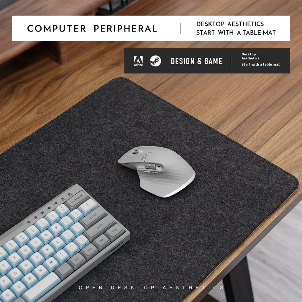 Oversized black grey felt and cork mouse mat on office desk with non-slip backing