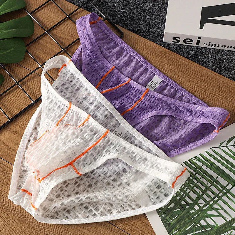 Men's white ice silk lace low waist briefs on a plain background