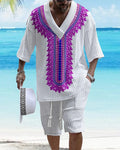 A man wearing a printed drop-shoulder knitted short-sleeved top with matching shorts in a casual setting.