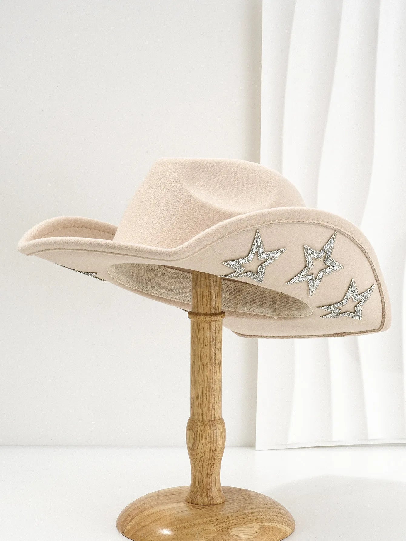 Beige polyester Western denim top hat with a conical crown and a hexagonal star decoration on the front.