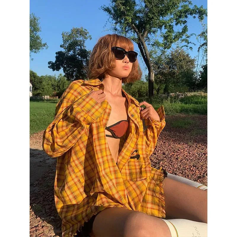 Dopamine yellow and black plaid pattern on a loose-fit men's and women's cardigan-style shirt.
