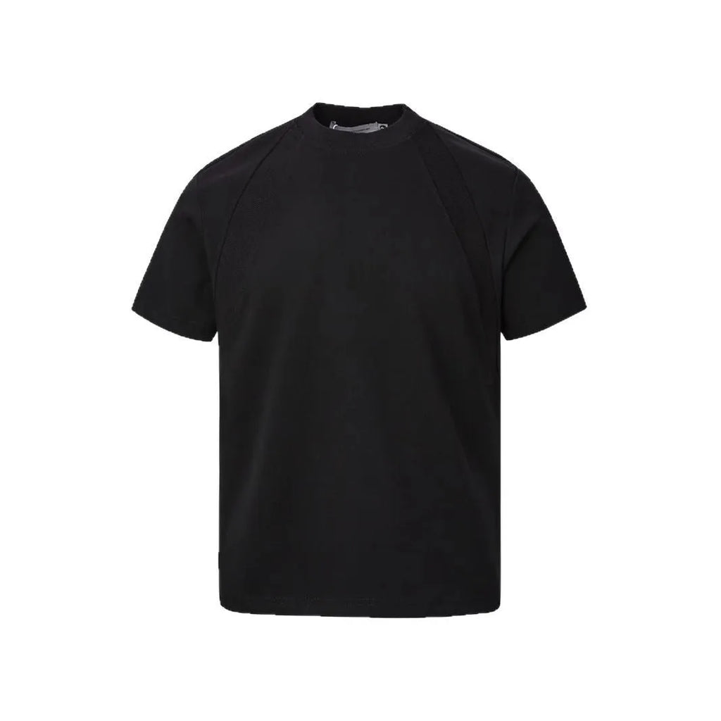 Short sleeve polyester top with textured air layer stitching in a loose fit.
