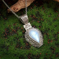 Silver heart-shaped vintage moonstone drop necklace on alloy chain