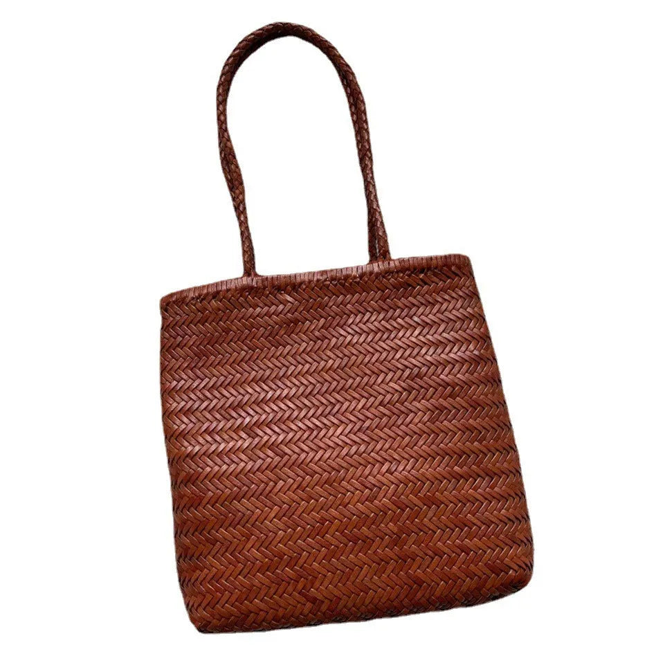 Brown handmade woven leather tote bag with outer pocket