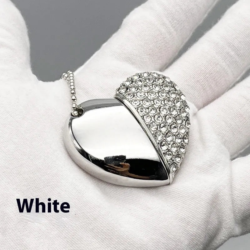 Blue heart-shaped metal USB flash drive with a brick pattern design on a white background.