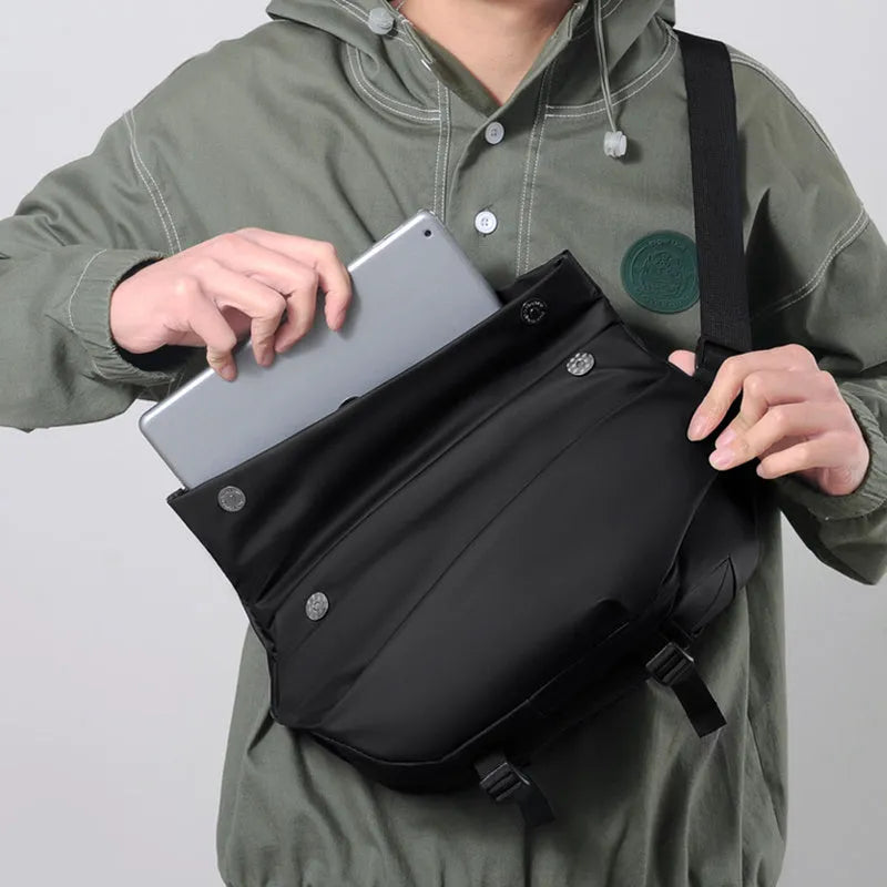 Grey PU leather crossbody bag showing internal phone pocket and document sleeve organisation
