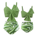 Women's big bow bikini print swim trunks set in orange with nylon fabric, front view