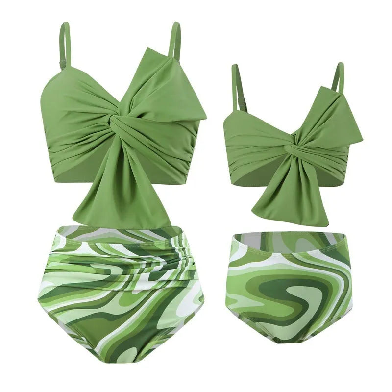 Women's big bow bikini print swim trunks set in orange with nylon fabric, front view