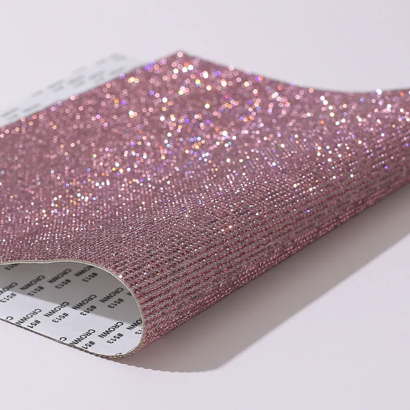 Rhinestone adhesive sheet with eight-eye pattern in multiple colour options on white background