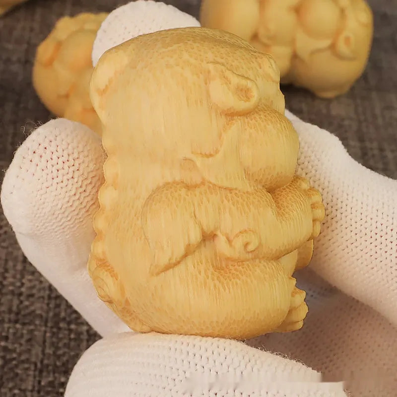 Solid bamboo money cat carving ornament measuring 4.5cm by 3.5cm