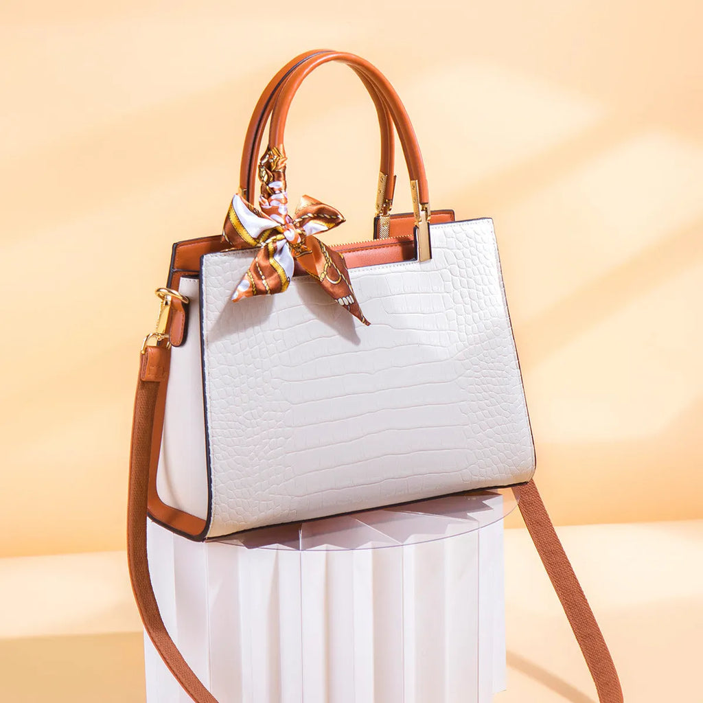 Milky white PU shoulder handbag with horizontal square shape and internal organisational compartments
