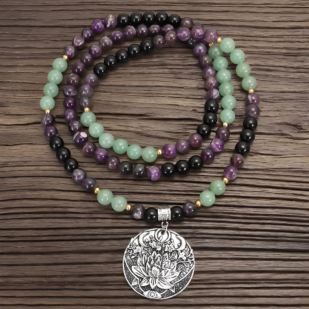 Yoga lotus pendant necklace with handmade stone beads and matching bracelet on adjustable chain.