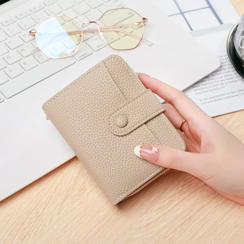 Ladies' short wallet with lychee pattern in beige, pink, black, and red colour options