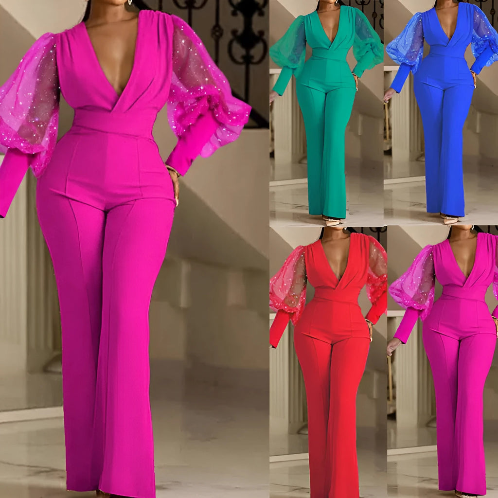 Red women's jumpsuit with mesh stitching on long sleeves, slim bodice, wide legs, and an elastic waist.