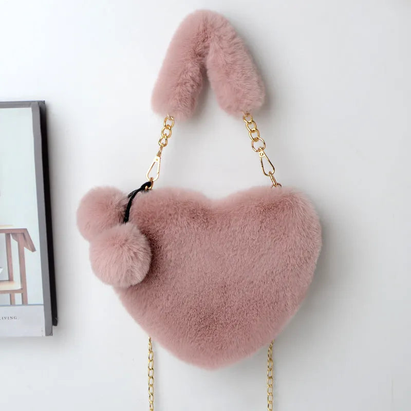 Heart-shaped women's plush handbag with soft texture and detachable shoulder strap in medium size