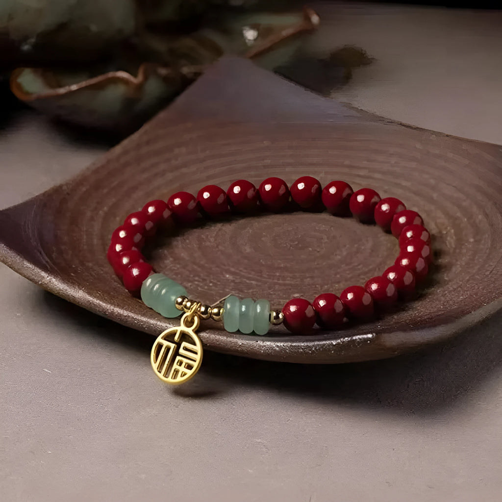Handmade gold cinnabar wave bracelet with copper beads in national style unisex design.