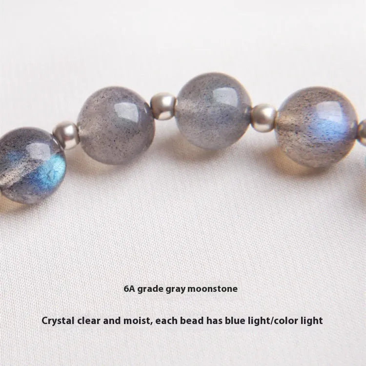 Women's moonstone bracelet with 7.5mm grey stone, red quartz accents and sterling silver