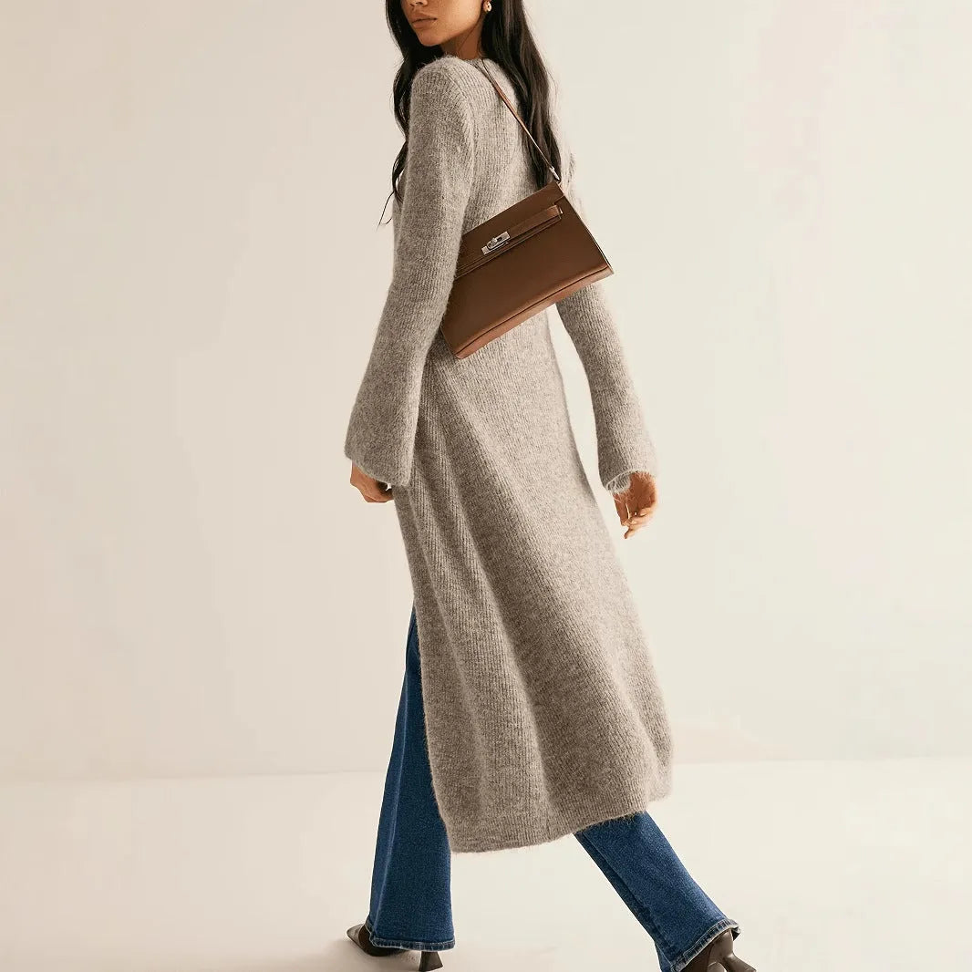 Khaki coloured French style retro long sleeve cardigan coat with button front closure.
