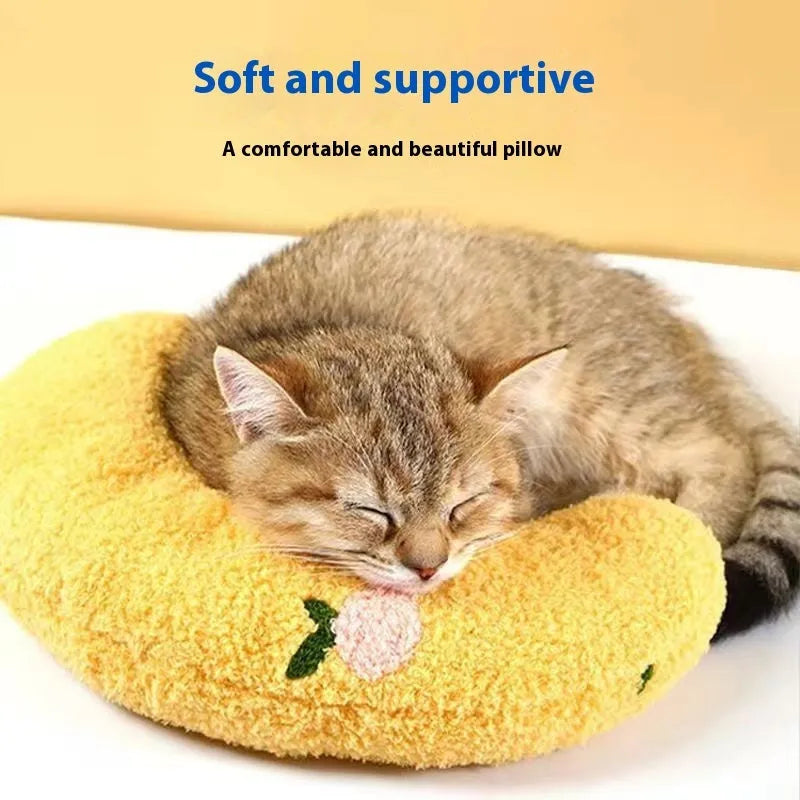 Blue cat sleeping mat with a U-shaped question mark pillow for neck support
