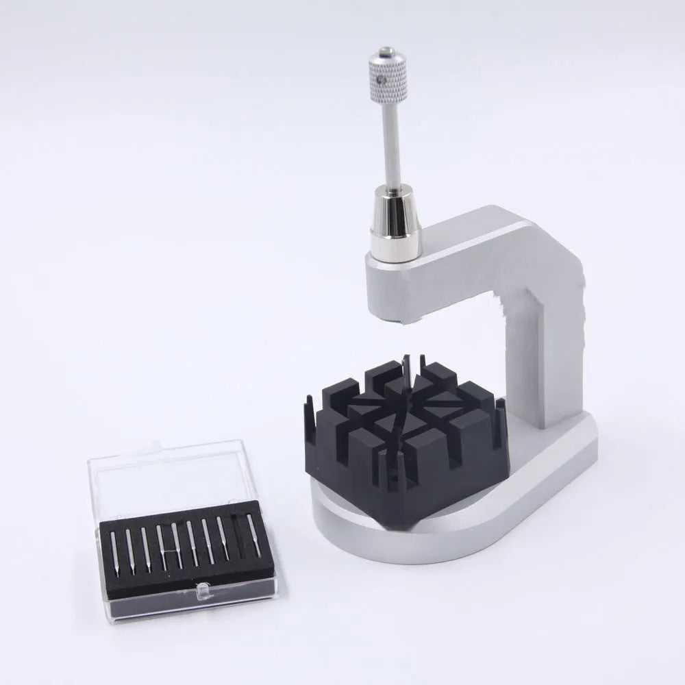 Silver multi-purpose press strap removal tool made from tool steel for watches, jewellery, and electronics.
