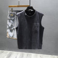Women's loose-fit black cotton sleeveless t-shirt with straight hem on a hanger.