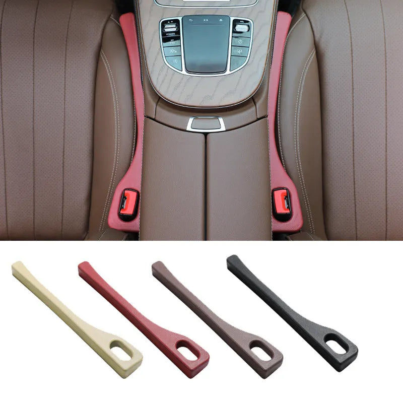 Flexible polyurethane car seat gap strip in black colour lying next to a car seat.