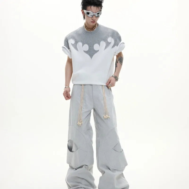Men's grey short sleeve shirt with a raised burnt flower design and rhinestone detail on the chest.