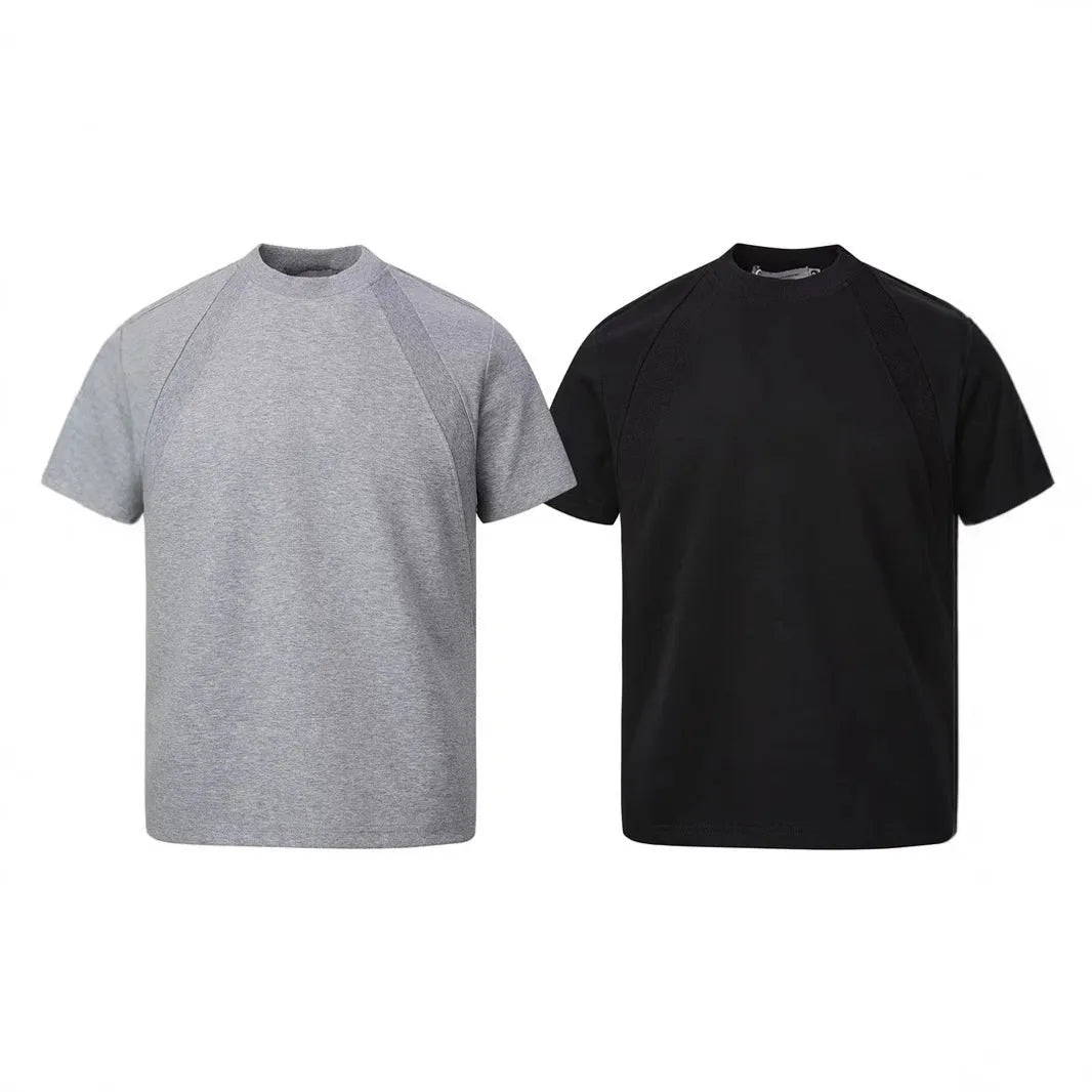 Short sleeve polyester top with textured air layer stitching in a loose fit.
