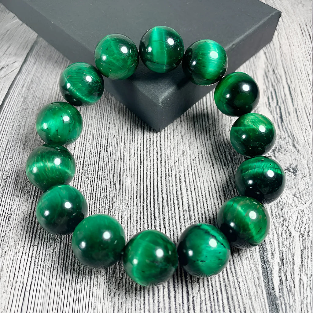 Natural green tiger eye stone bracelet with geometric polished beads in various sizes