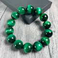Natural green tiger eye stone bracelet with geometric polished beads in various sizes