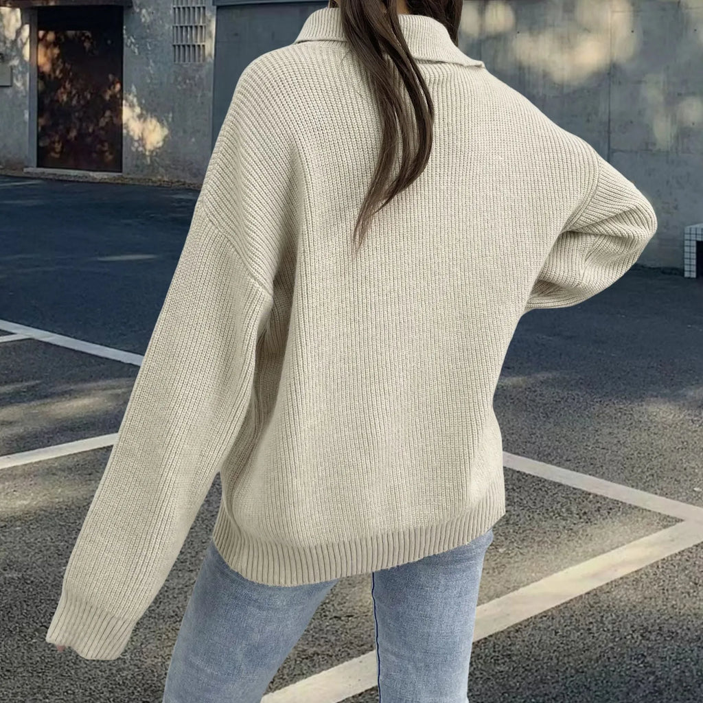 Women's grey alpaca wool pullover sweater with turtleneck, loose lapels, and an oblique diagonal zipper.