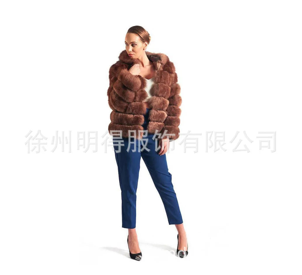 Women's loose artificial fur coat with hood in brown colour on mannequin