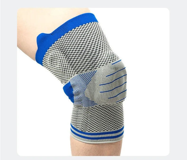 Cotton knee pads with silicone massage and spring bar shock absorber in black and blue colour combination.