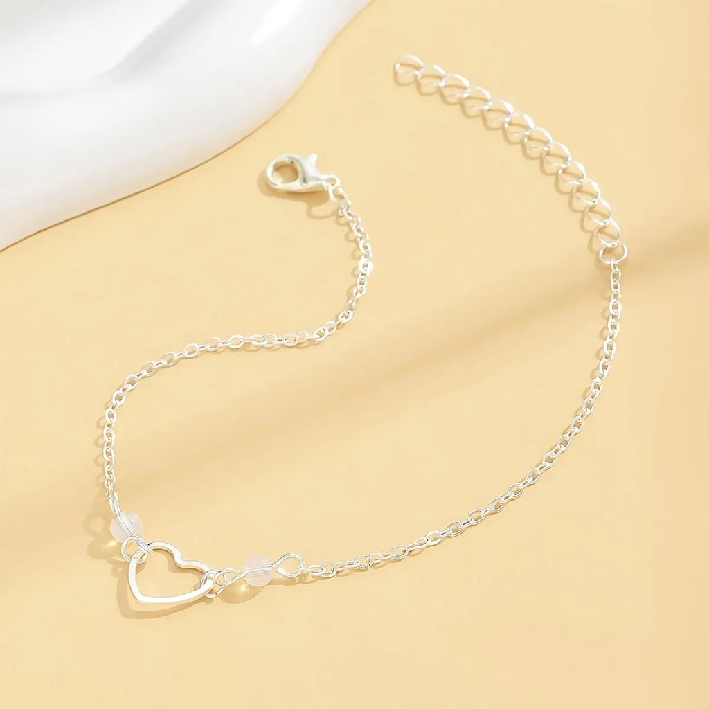 Adjustable women's anklet with heart pendant in gold or silver alloy finish