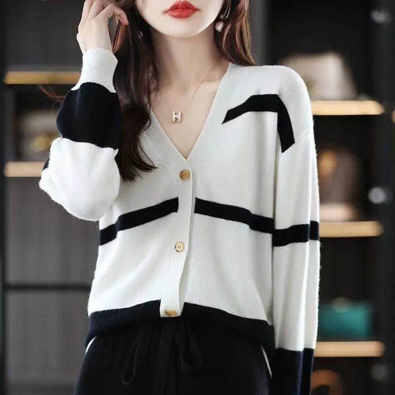Women's striped V-neck knitted cardigan with 3D pattern in a slim fit, shown in multiple colour options.