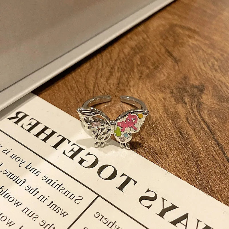 Copper Chinese butterfly women's ring showing creative design with oil dripping treatment finish