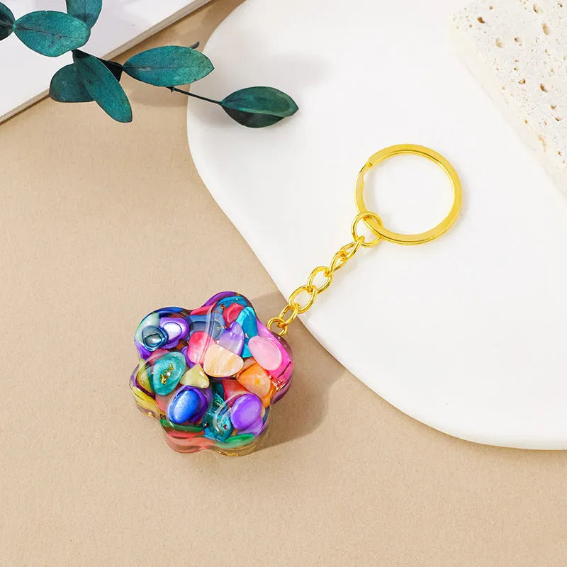 Natural crystal cat's paw keychain pendant charm in one of ten crystal types including pink crystal and amethyst.