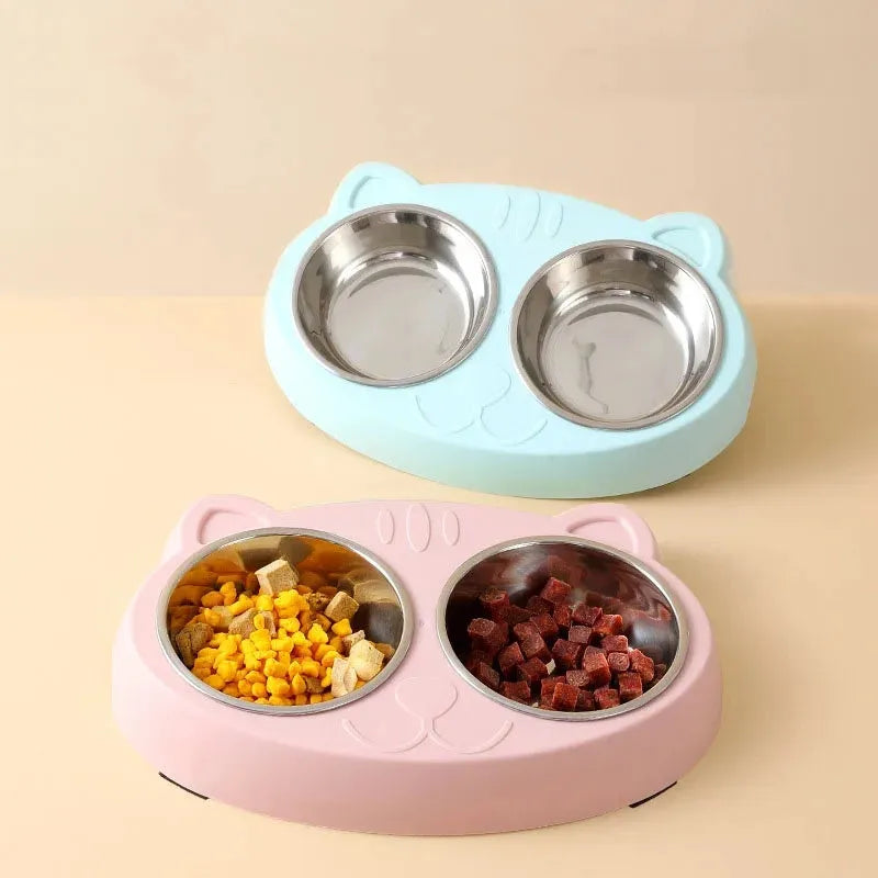 Blue macaron-shaped plastic pet feeding tray with two bowls for cat or dog food and water.