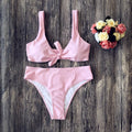 Solid colour polyester bikini swimsuit in five colour options showing front view
