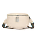 Women's soft PU leather messenger bag with saddle shape and crossbody strap in black, white or green colour options