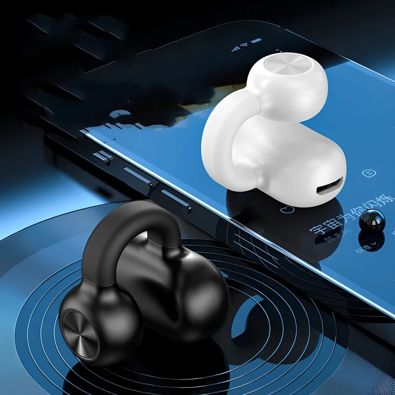 Wireless clip-on bone conduction Bluetooth headset in black OPP bag with charging cable.