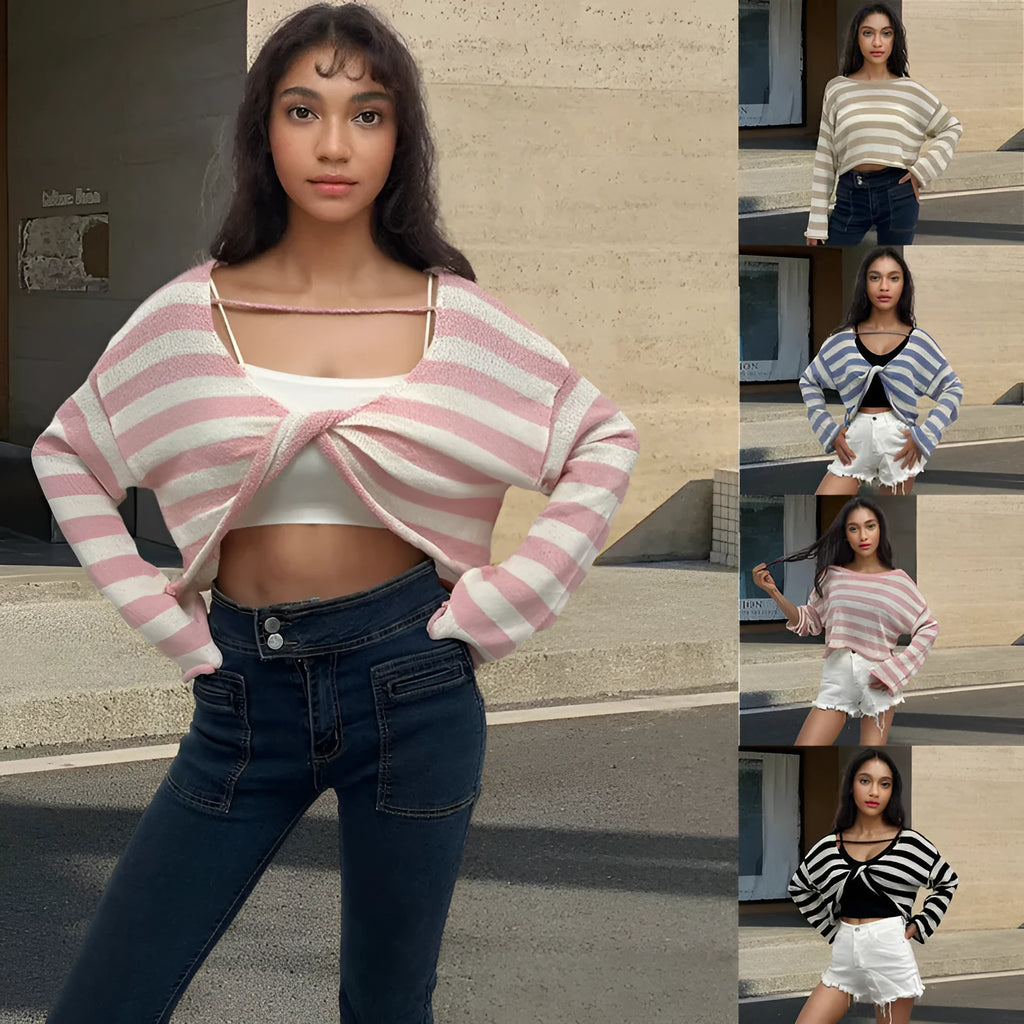Women's black and white striped cropped long sleeve sweater made from mercerised cotton on a model.