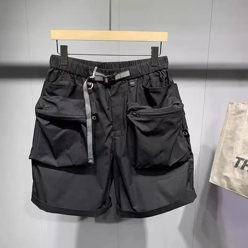 Men's loose fit work shorts in black or grey with pockets and non-iron treatment