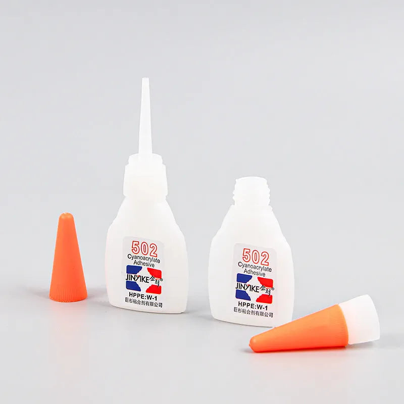 Two tubes of instant strong shoe repair adhesive glue, showing 3g and 8g size options.
