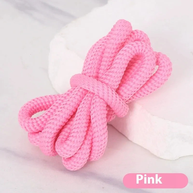Oval elastic shoelace adapter ropes in various colours on a white background.